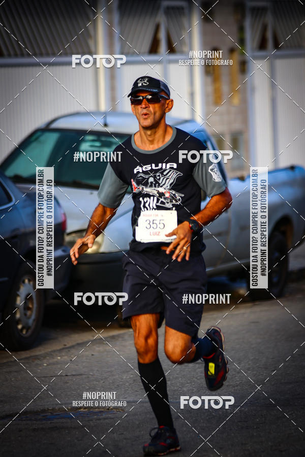 Buy your photos of the eventguia 13K Praia Grande on Fotop