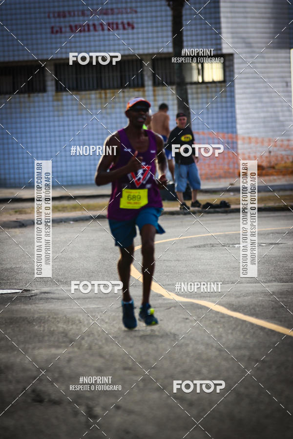 Buy your photos of the eventguia 13K Praia Grande on Fotop