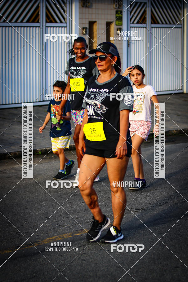 Buy your photos of the eventguia 13K Praia Grande on Fotop