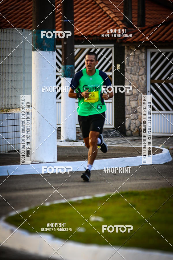 Buy your photos of the eventguia 13K Praia Grande on Fotop