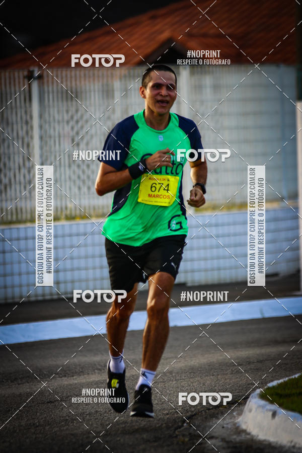 Buy your photos of the eventguia 13K Praia Grande on Fotop