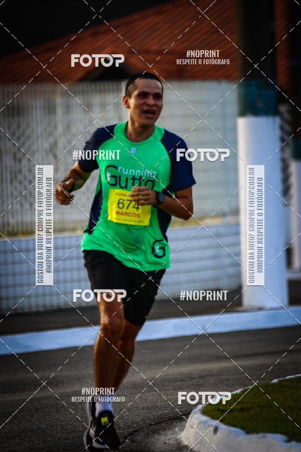Buy your photos of the eventguia 13K Praia Grande on Fotop