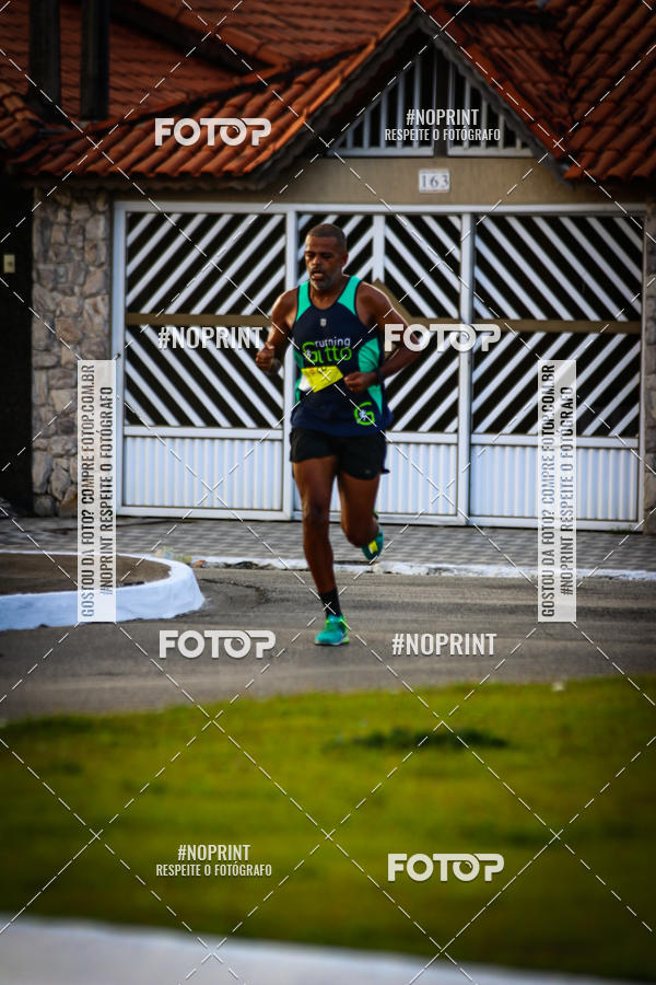 Buy your photos of the eventguia 13K Praia Grande on Fotop