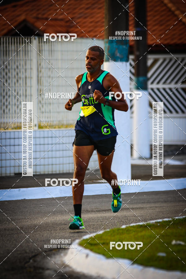 Buy your photos of the eventguia 13K Praia Grande on Fotop