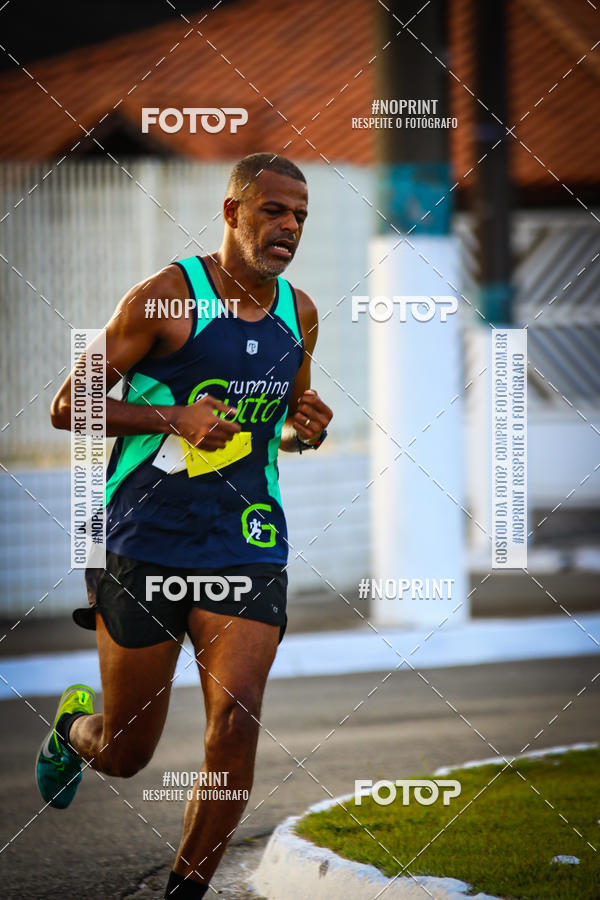 Buy your photos of the eventguia 13K Praia Grande on Fotop