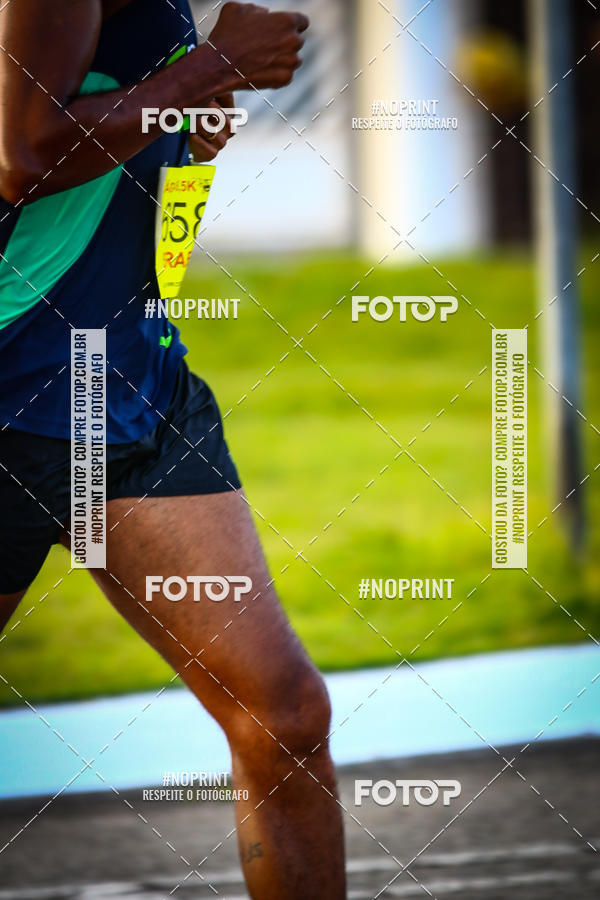Buy your photos of the eventguia 13K Praia Grande on Fotop