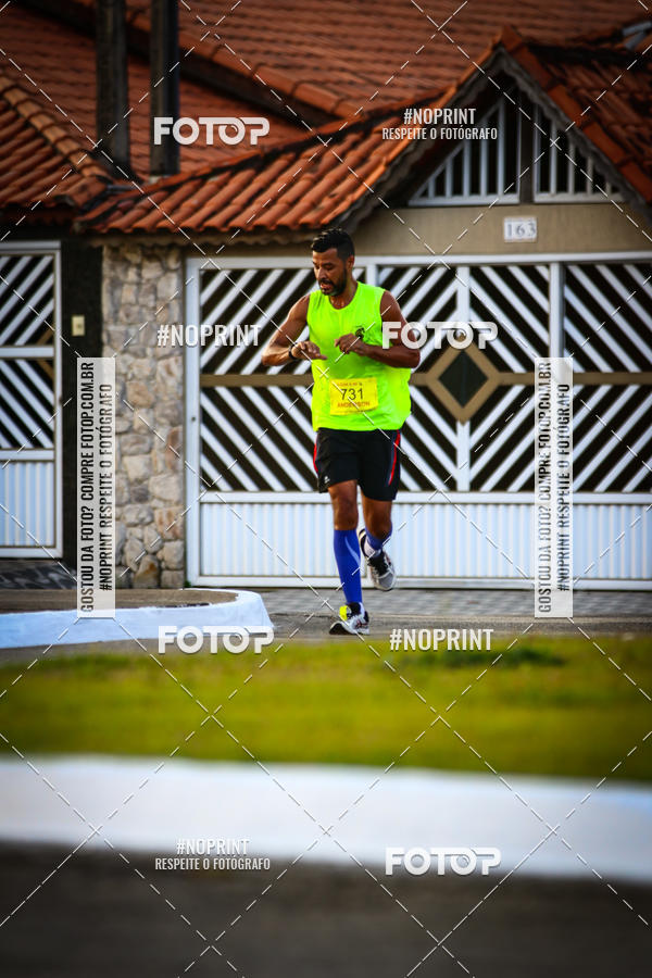 Buy your photos of the eventguia 13K Praia Grande on Fotop