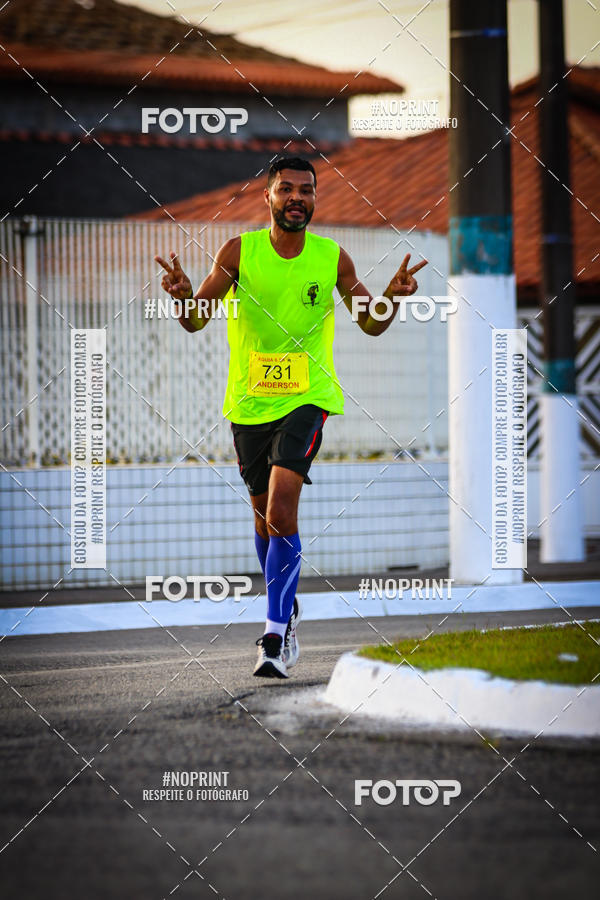 Buy your photos of the eventguia 13K Praia Grande on Fotop