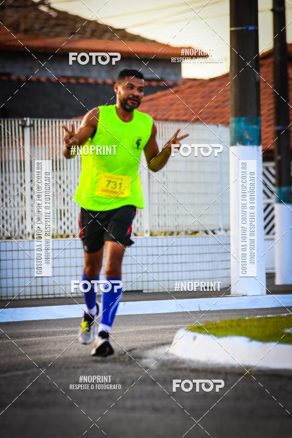 Buy your photos of the eventguia 13K Praia Grande on Fotop