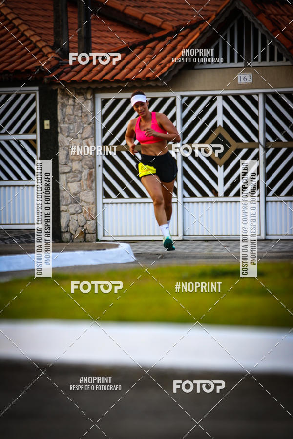 Buy your photos of the eventguia 13K Praia Grande on Fotop