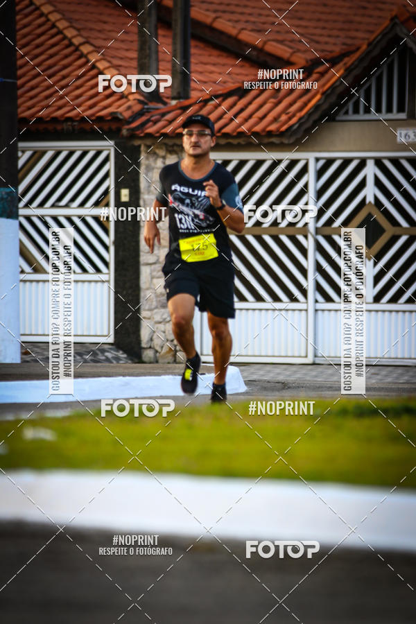 Buy your photos of the eventguia 13K Praia Grande on Fotop