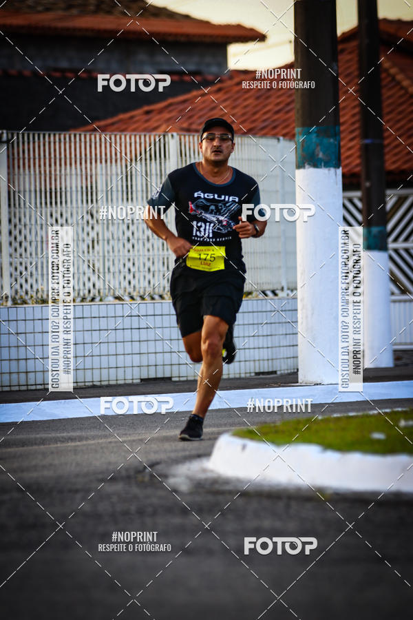 Buy your photos of the eventguia 13K Praia Grande on Fotop