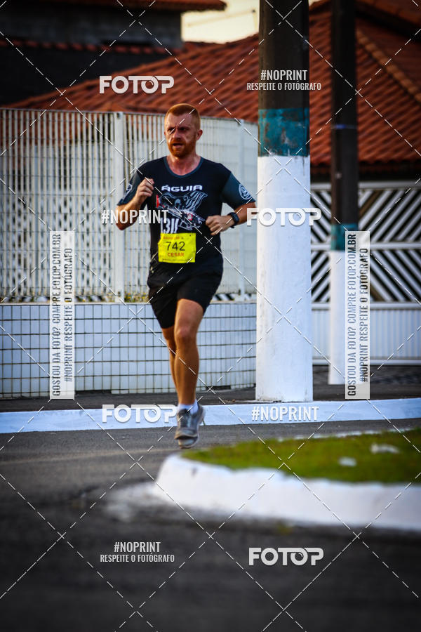 Buy your photos of the eventguia 13K Praia Grande on Fotop