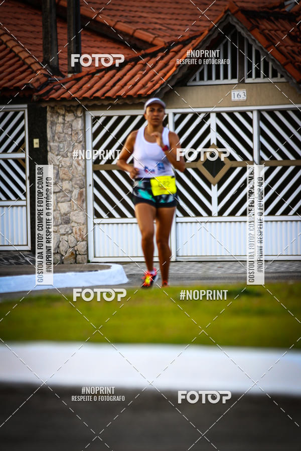 Buy your photos of the eventguia 13K Praia Grande on Fotop