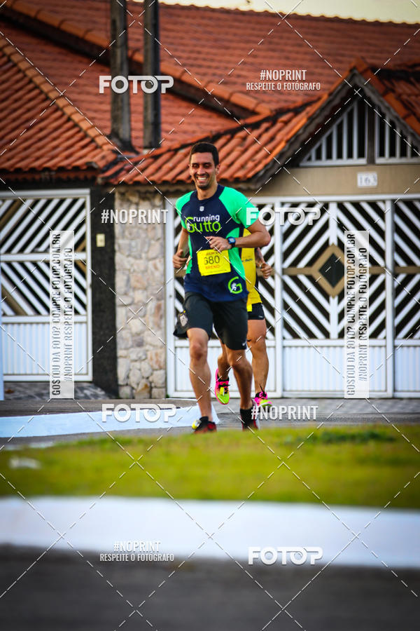 Buy your photos of the eventguia 13K Praia Grande on Fotop