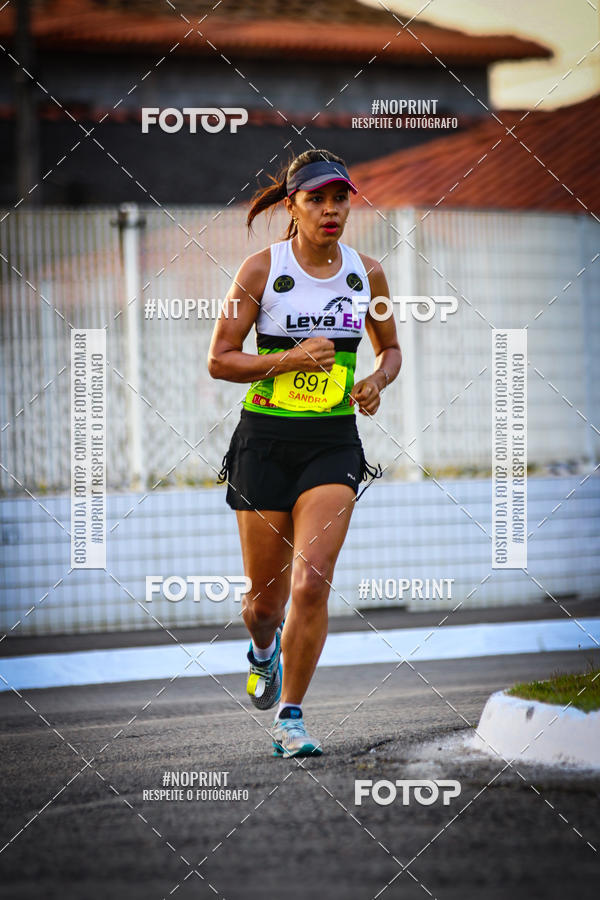Buy your photos of the eventguia 13K Praia Grande on Fotop