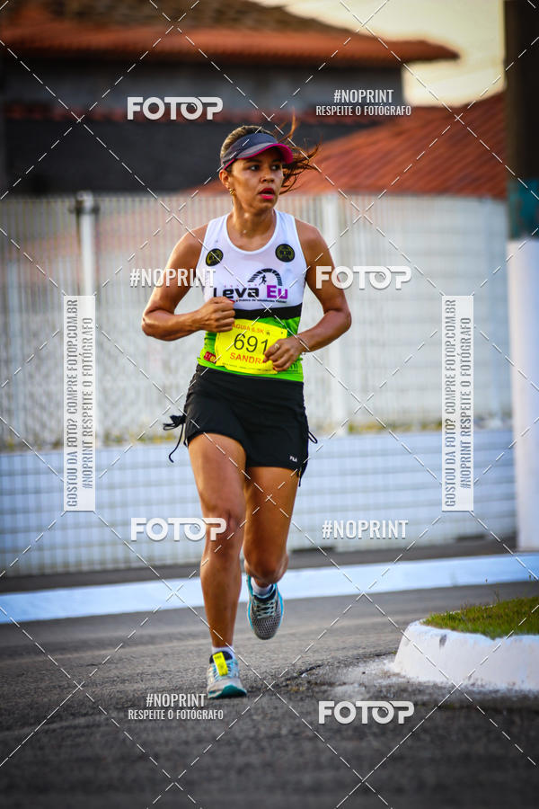 Buy your photos of the eventguia 13K Praia Grande on Fotop
