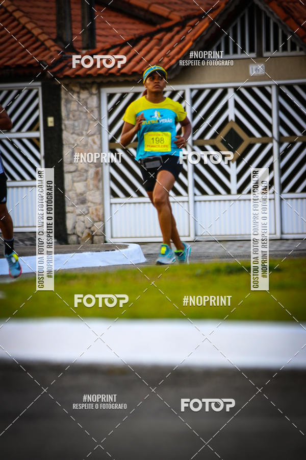 Buy your photos of the eventguia 13K Praia Grande on Fotop