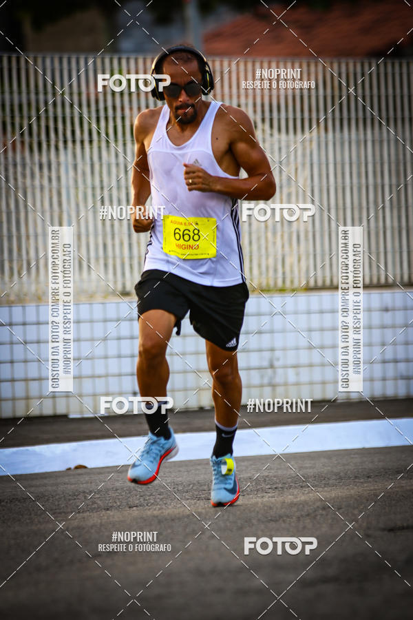 Buy your photos of the eventguia 13K Praia Grande on Fotop