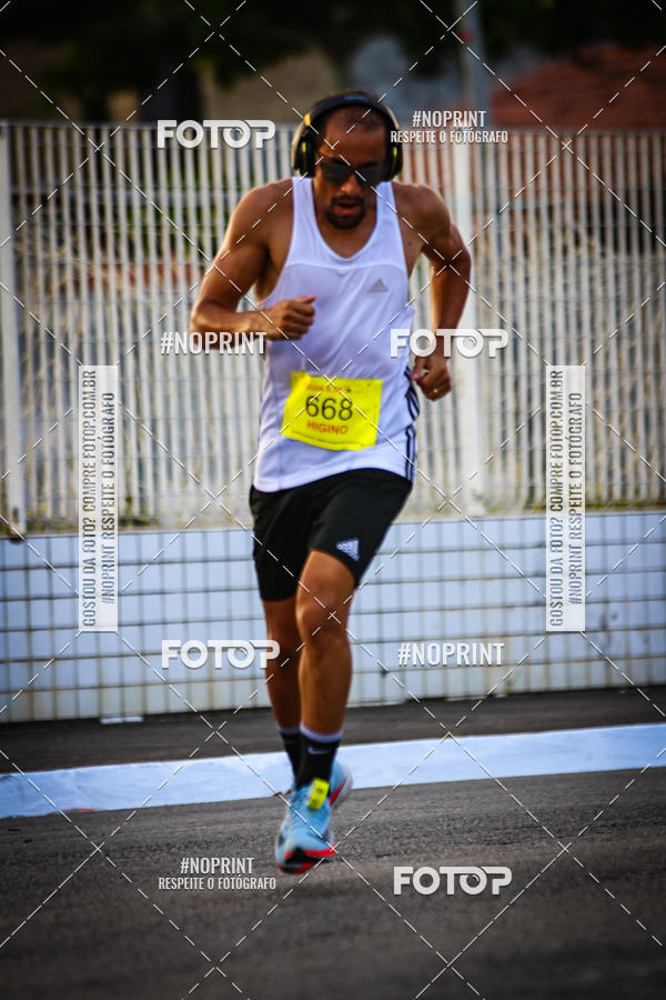 Buy your photos of the eventguia 13K Praia Grande on Fotop