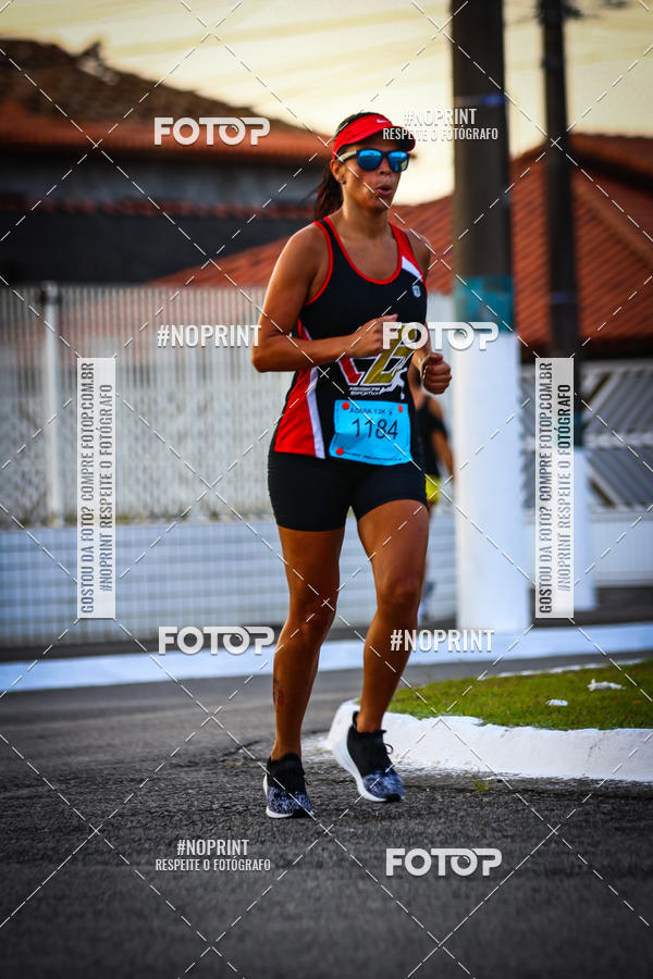 Buy your photos of the eventguia 13K Praia Grande on Fotop
