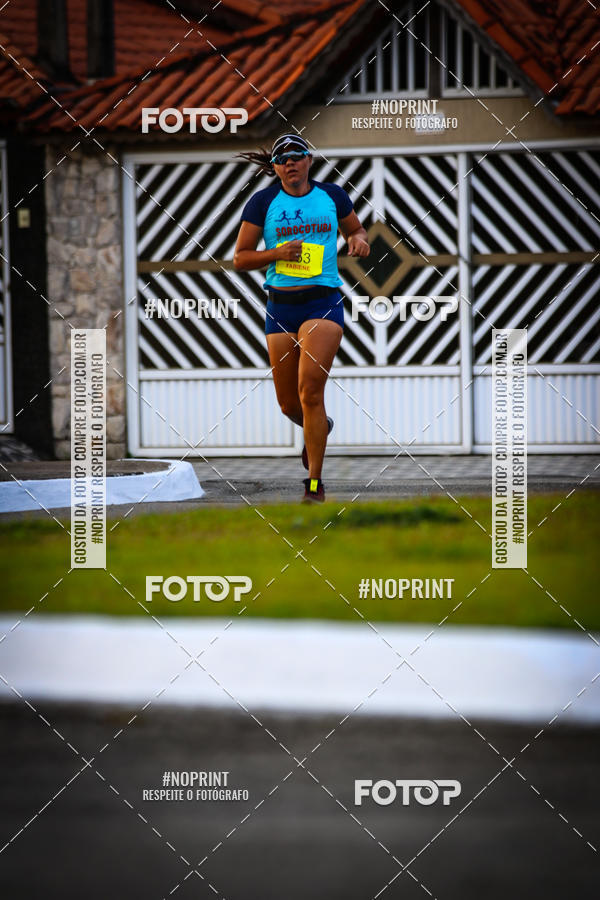 Buy your photos of the eventguia 13K Praia Grande on Fotop
