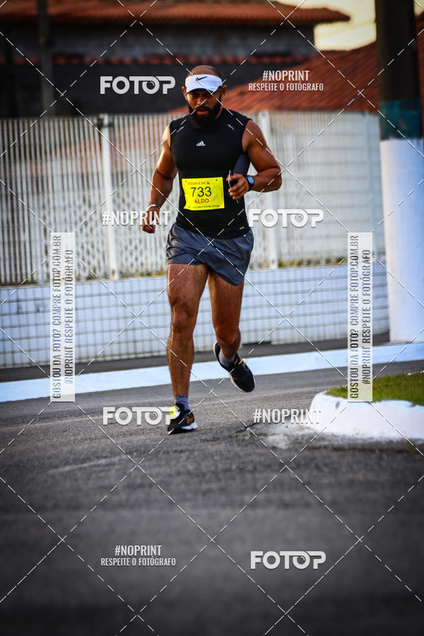 Buy your photos of the eventguia 13K Praia Grande on Fotop