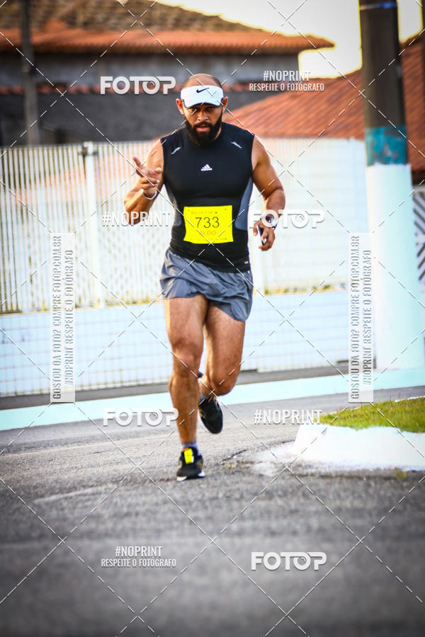 Buy your photos of the eventguia 13K Praia Grande on Fotop