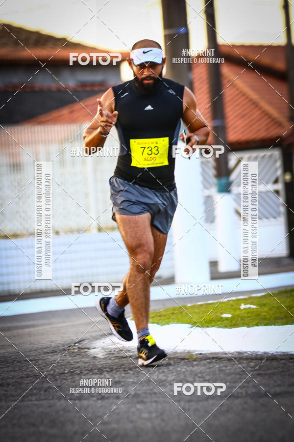 Buy your photos of the eventguia 13K Praia Grande on Fotop