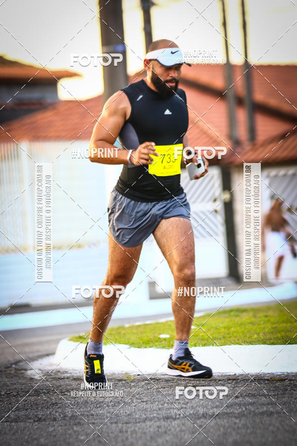 Buy your photos of the eventguia 13K Praia Grande on Fotop
