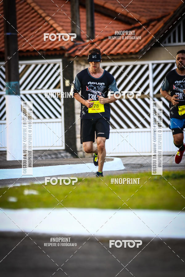 Buy your photos of the eventguia 13K Praia Grande on Fotop