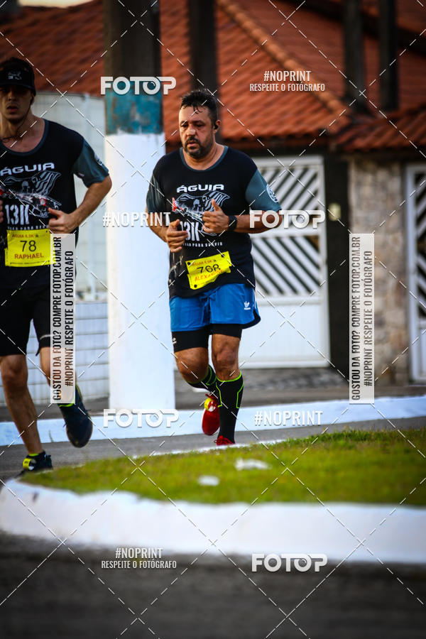 Buy your photos of the eventguia 13K Praia Grande on Fotop