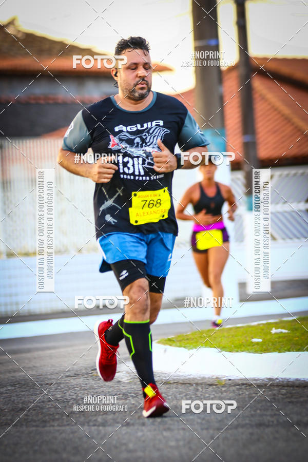 Buy your photos of the eventguia 13K Praia Grande on Fotop