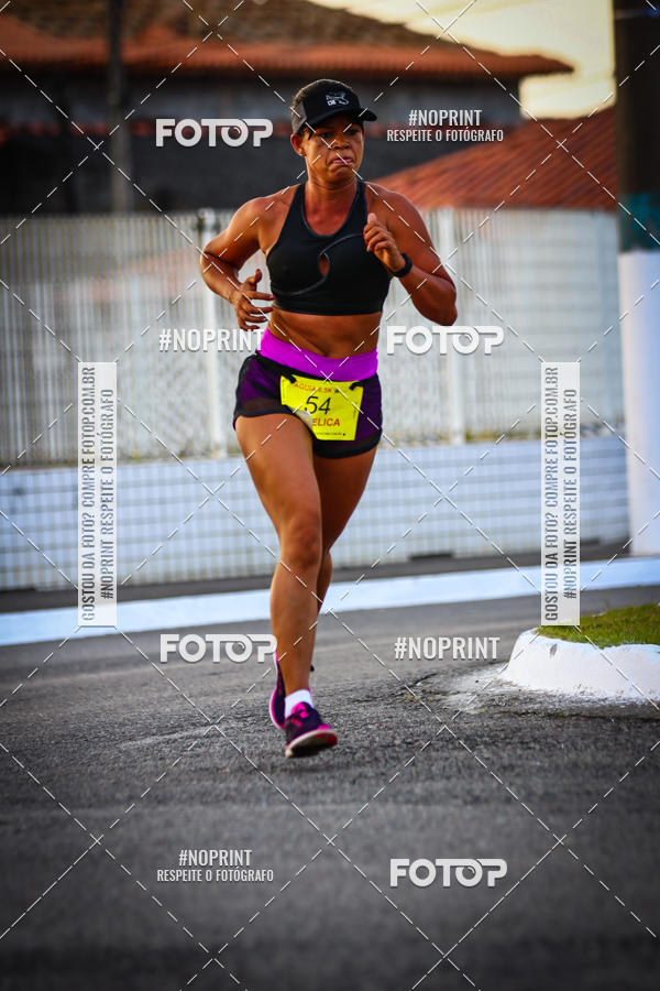 Buy your photos of the eventguia 13K Praia Grande on Fotop