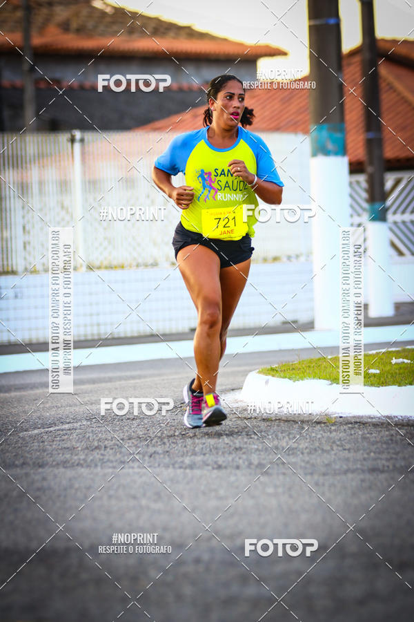 Buy your photos of the eventguia 13K Praia Grande on Fotop