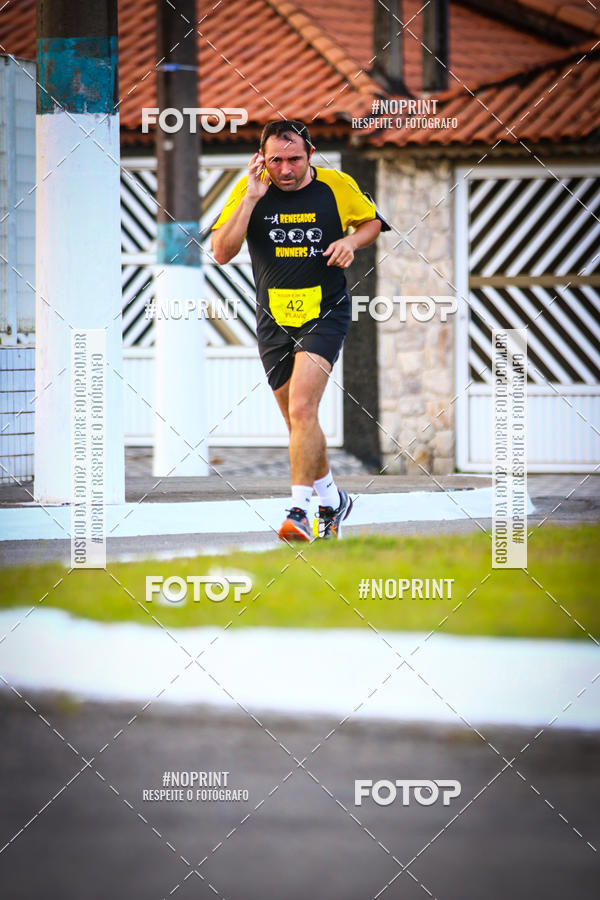 Buy your photos of the eventguia 13K Praia Grande on Fotop