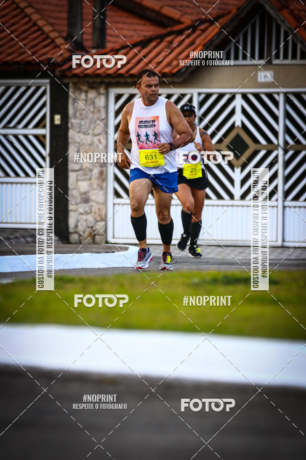 Buy your photos of the eventguia 13K Praia Grande on Fotop
