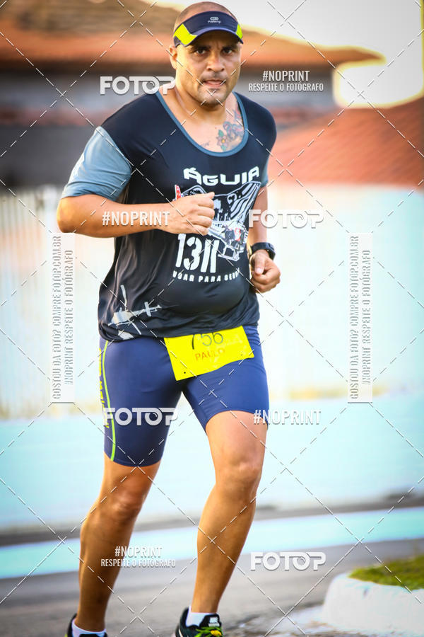 Buy your photos of the eventguia 13K Praia Grande on Fotop