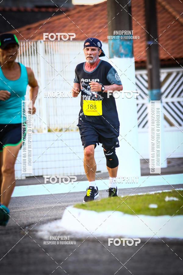 Buy your photos of the eventguia 13K Praia Grande on Fotop