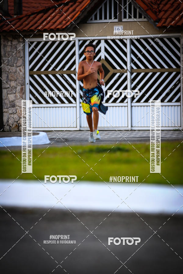 Buy your photos of the eventguia 13K Praia Grande on Fotop