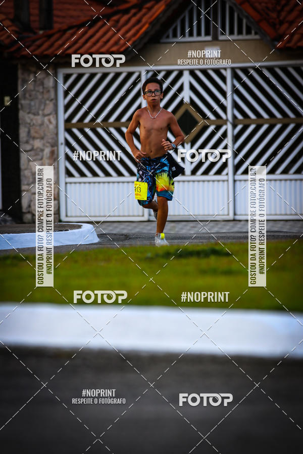 Buy your photos of the eventguia 13K Praia Grande on Fotop