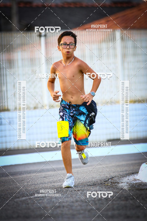 Buy your photos of the eventguia 13K Praia Grande on Fotop