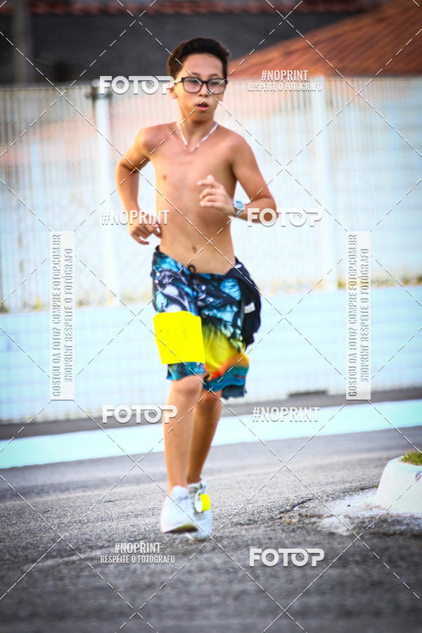 Buy your photos of the eventguia 13K Praia Grande on Fotop