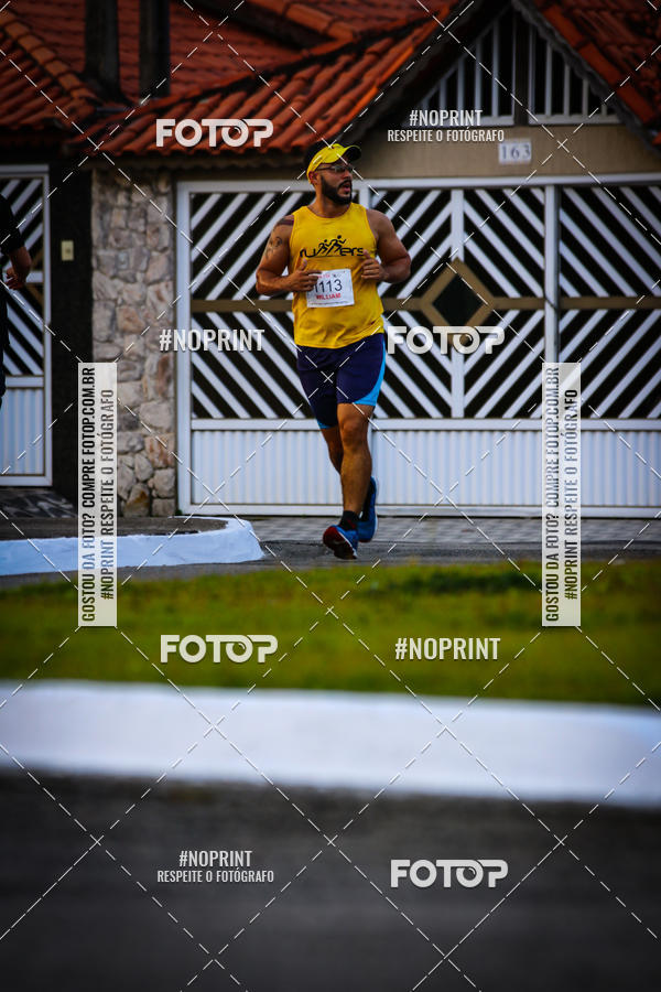 Buy your photos of the eventguia 13K Praia Grande on Fotop