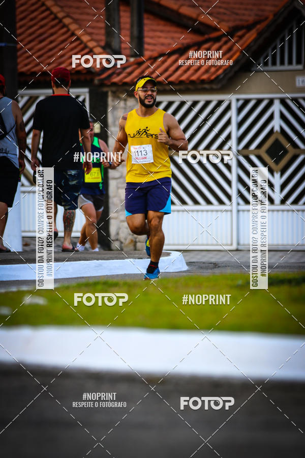 Buy your photos of the eventguia 13K Praia Grande on Fotop