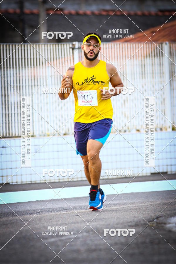 Buy your photos of the eventguia 13K Praia Grande on Fotop