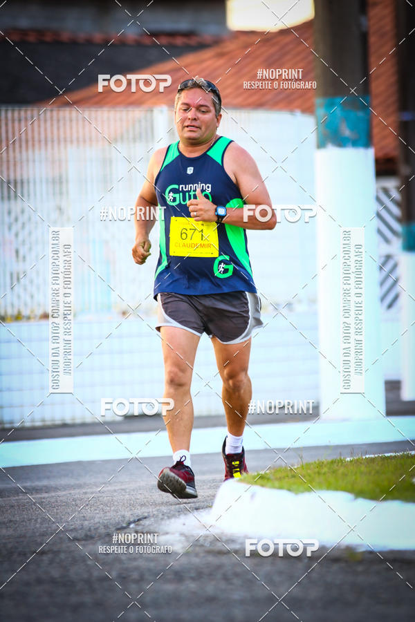 Buy your photos of the eventguia 13K Praia Grande on Fotop