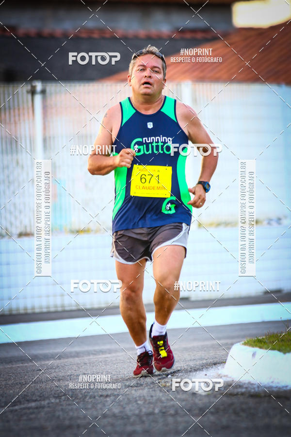 Buy your photos of the eventguia 13K Praia Grande on Fotop