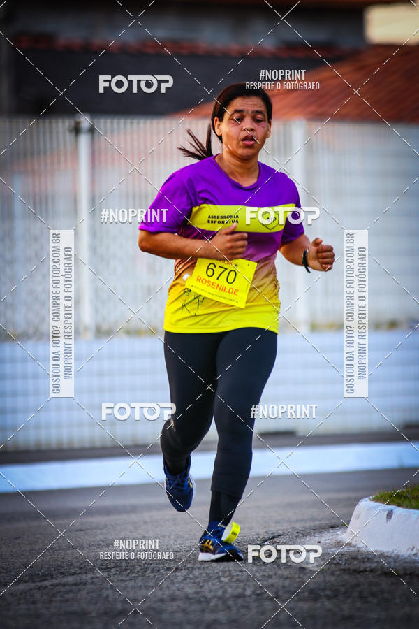 Buy your photos of the eventguia 13K Praia Grande on Fotop