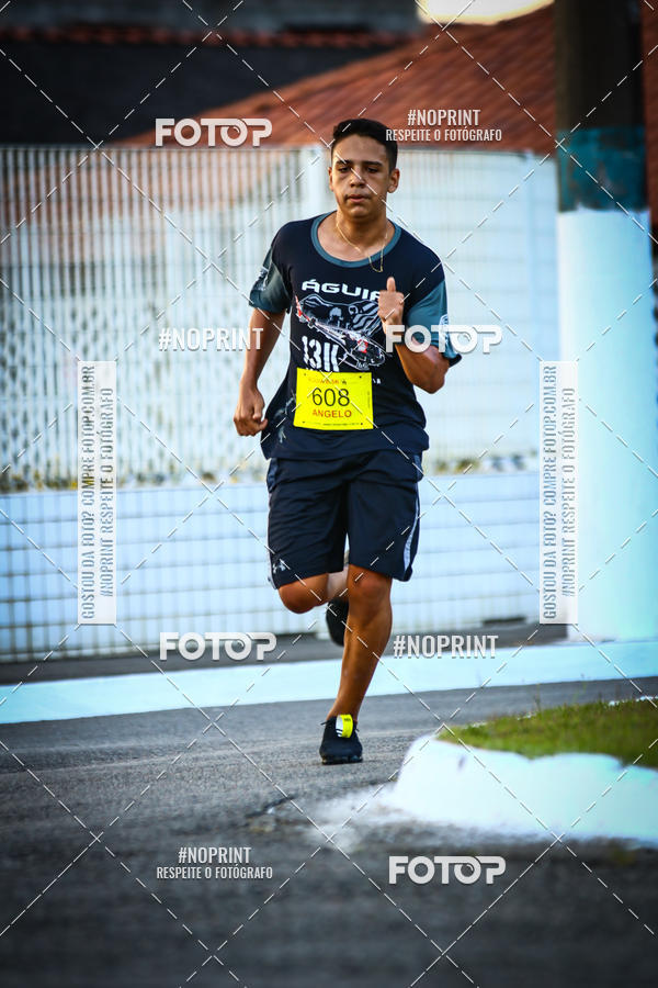 Buy your photos of the eventguia 13K Praia Grande on Fotop